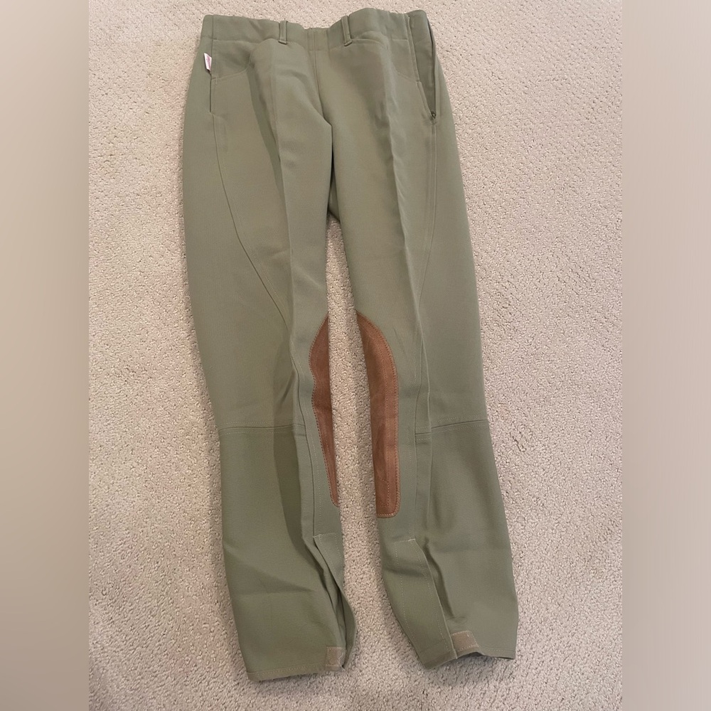 Size 26 Tailored Sportsman riding breeches. Excellent condition.